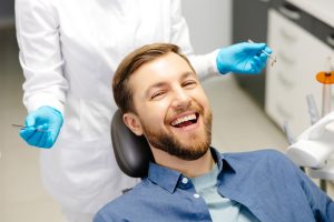 young man visiting the dentist